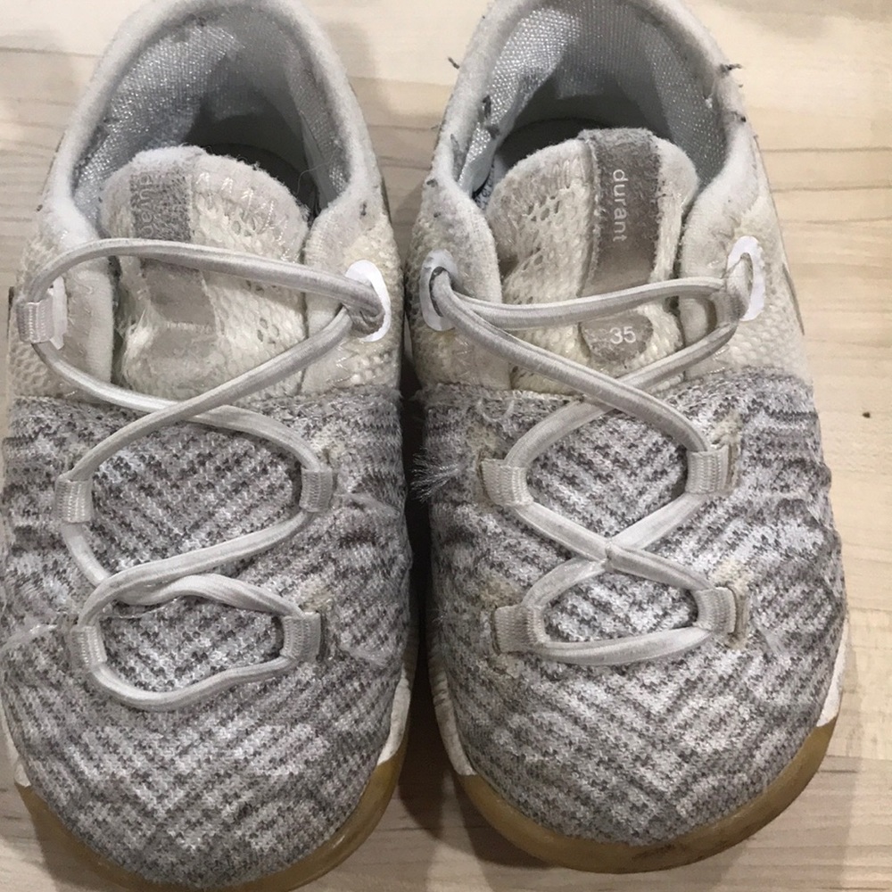 Nike KD in white with elastic laces.  Size 5c